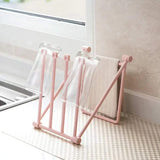 Free standing towel rack