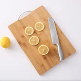 Heavy wooden chopping board with metallic handle