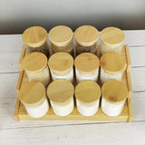 12pcs glass spice jar set with a brown bamboo stand