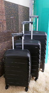 Rubber suitcases   [Set of 3]