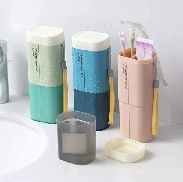 Portable toothbrush and toothpaste holder with a detachable cup