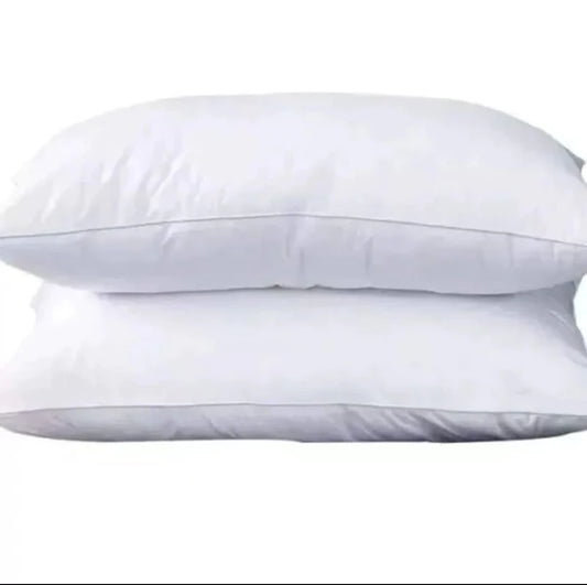 A pair of DFDC compressed comfy pillows