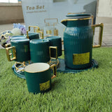 Tea set with gold rim