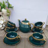 Tea set with gold rim